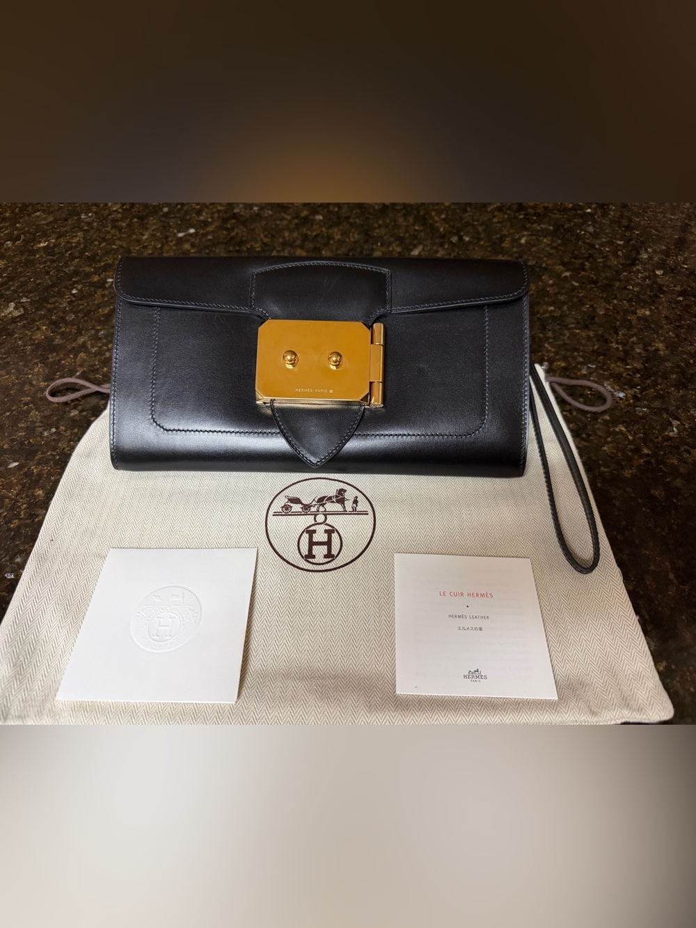 Hermès Black Leather Shoulder Clutch with Gold-Tone Accent